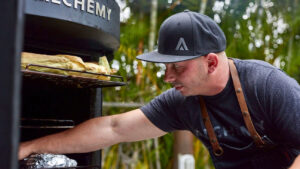 A photo of Matt Basile and his Alchemy grill (Photo credit Kyla Zanardi)